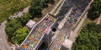 An aerial view of paddlers packed into the two tubs of the Peterborough Lift Lock for the seventh annual Lock & Paddle event on July 19, 2025. (Photo: Parks Canada)