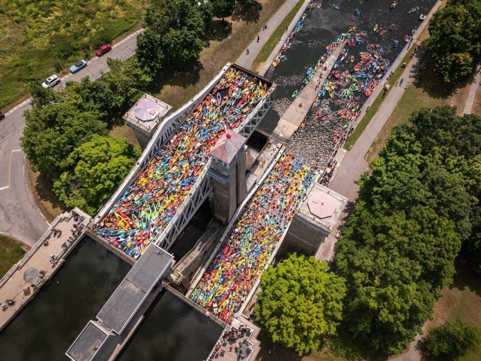 An aerial view of paddlers packed into the two tubs of the Peterborough Lift Lock for the seventh annual Lock & Paddle event on July 19, 2025. (Photo: Parks Canada)