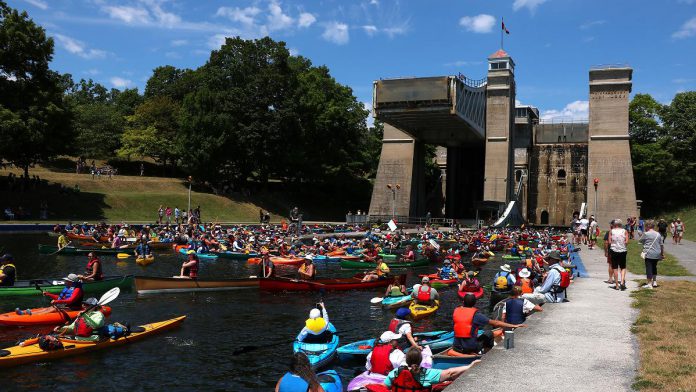 Some of the 1,400 paddlers in 978 canoes and kayaks who took part in the seventh annual Lock & Paddle event at the Peterborough Lift Lock on July 19, 2025. (Photo: Sean Bruce)