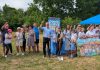 The Peterborough Foundation recently awarded a $10,000 grant to Our Daughters' Home, one of nine Peterborough-area charities that received a total of $52,150 from the foundation, whose board meets bi-annually to review grant applications. The grant for Our Daughters' Home will support the purchase of an accessible duplex to be built on Sophia Street in Peterborough East City for seven adult women with developmental disabilities. Pictured are attendees celebrating during a ground-breaking ceremony on July 9, 2025 for the new build, a partnership between Habitat for Humanity Peterborough & Kawartha Region and Our Daughters' Home. (Photo: Bruce Head / kawarthaNOW)
