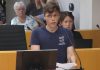 Auden Palmer, director of outreach services at One City Peterborough, addresses Peterborough city council on July 2, 2025 before councillors voted 6-5 against providing continued funding for expanded services at Trinity Centre in 2026 for people experiencing homelessness. (kawarthaNOW screenshot of City of Peterborough video)