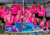 The Peterborough Special Olympic women's soccer team (Candace Bushie, Crystal Cochrane, Jasmine Davis, Haley Fowler, Heather Fowler, Nicole Hewitt, Kristen Lackey, Gillian McHugh, Miriam McHugh, Kacee Quinlan, Jenn Wildman, and Carlea Wilkie-Ellis) with coaches Debbie Quinlan, Shawna Goode, and Linda Wilkie celebrating the first-ever gold medal in the women's soccer division at the Special Olympics provincial games, held in Brantford from July 10 to 13, 2025. (Photo: Special Olympics Ontario)