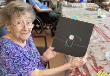 Mary, a resident of Victoria Manor in Lindsay, displays an artwork she created as part of the new "Seniors for Seniors" art program offered by Kawartha Art Gallery with support from the City of Kawartha Lakes. (Photo: Kawartha Art Gallery)