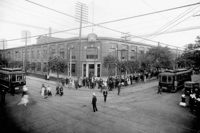 The corner of King and Dufferin Streets in Toronto, pictured circa 1917, was the location of the Russell Motors Car Co. munitions factory where Amy Terrill's Great Aunt Frankie and Great Aunt Mattie worked during World War I. Terrill passed by the same corner every day when she was working for Music Canada and, while reading her great aunt's written family history while on the GO train in 2015, she was inspired to begin writing her debut novel "No Secrets Among Sisters" in 2020. (Photo: Library and Archives Canada)