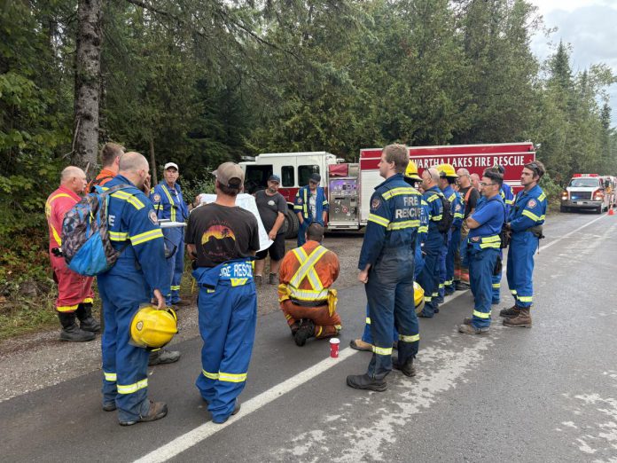Kawartha Lakes Fire Rescue Service crews receiving a briefing about the HAL019 fire east of Burnt River in Kawartha Lakes. (Photo: City of Kawartha Lakes)