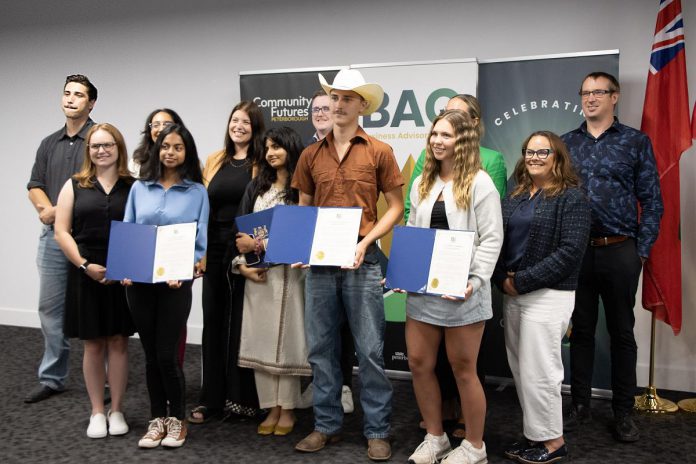 The graduates of the Summer Company program administered by the Business Advisory Centre (BAC) of Community Futures Peterborough (CFP) were celebrated at an event on August 13, 2025 at Venture North in downtown Peterborough. The graduates (holding certificates) are, left to right, Bisma Razaque, Neha Mervin, Spencer Toth, and Lauren Connolly (absent are Haydon Meade and Teaghan Hartnett). Also pictured from left to right are Joel Porter on behalf of Peterborough-Kawartha MPP Dave Smith, BAC entrepreneurship officer Allison Adam, Peterborough DBIA executive director Nour Mazloum, BAC manager Rose Terry, City of Peterborough economic development director Darryl Julott, CFP executive director Devon Girard (hidden), Peterborough County economic development manager Rhonda Keenan, and Peterborough and Kawarthas Chamber of Commerce vice-president Joel Wiebe. (Photo courtesy of Community Futures Peterborough) The graduates of the Summer Company program administered by the Business Advisory Centre (BAC) of Community Futures Peterborough (CFP) were celebrated at an event on August 13, 2025 at Venture North in downtown Peterborough. The graduates (holding certificates) are, left to right, Bisma Razaque, Neha Mervin, Spencer Toth, and Lauren Connolly (absent are Haydon Meade and Teaghan Hartnett). Also pictured from left to right are Joel Porter on behalf of Peterborough-Kawartha MPP Dave Smith, BAC entrepreneurship officer Allison Adam, Peterborough DBIA executive director Nour Mazloum, BAC manager Rose Terry, City of Peterborough economic development director Darryl Julott, CFP executive director Devon Girard (hidden), Peterborough County economic development manager Rhonda Keenan, and Peterborough and Kawarthas Chamber of Commerce vice-president Joel Wiebe. (Photo courtesy of Community Futures Peterborough)