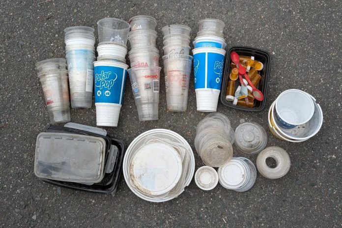 Clean Up Peterborough founder Steve Paul went through two bags of plastic, collected during spring clean-ups organized by the grassroots volunteer environmental group, to identify the different types of plastics used. Pictured are items made of #5 plastic, also known as polypropylene. Despite being accepted by curbside recycling programs, #5 plastic is one of the least recycled plastics in Canada, with estimates showing less than five per cent ever gets recycled. Paul is planning a new micro-recycling and makerspace initiative called Second Nature Studio that will initially make use of #5 plastic before expanding to include other plastics. (Photo: Steve Paul)