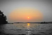 A haze of forest fire smoke obscuring the sun in Haliburton County the evening of August 2, 2025. (Photo: Jeannine Taylor / kawarthaNOW)