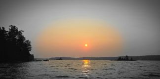 A haze of forest fire smoke obscuring the sun in Haliburton County the evening of August 2, 2025. (Photo: Jeannine Taylor / kawarthaNOW)