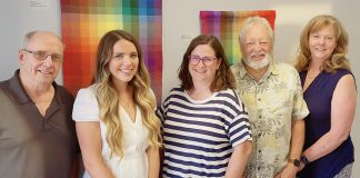 Haliburton Highlands Healthy Democracy Project (HHHDP) steering committee members Sean Pennylegion, Jessica Slade, Lauren Hunter, Barrie Martin, and Carol Moffatt in front of part of a textile collection by local artist Wendy Wood at The Link in Haliburton. To help promote greater civic engagement in the 2026 municipal election and beyond, the grassroots community group is hosting a four-part "Voices & Votes" speaker series with the first two events this fall. (Photo: HHHDP)
