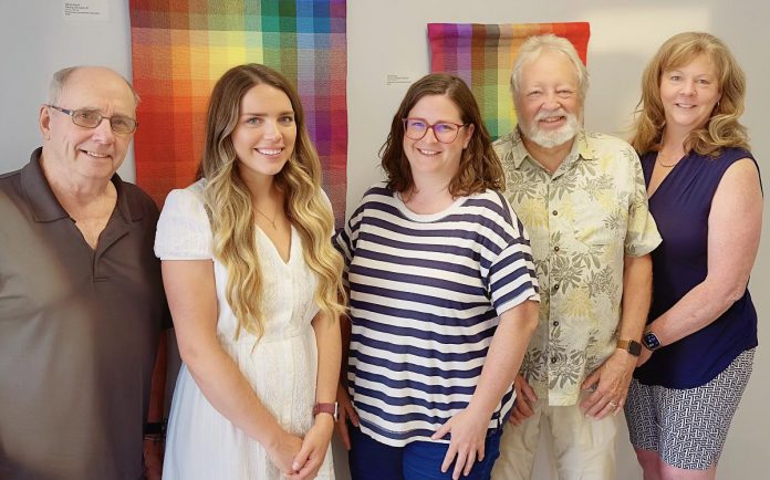 Haliburton Highlands Healthy Democracy Project (HHHDP) steering committee members Sean Pennylegion, Jessica Slade, Lauren Hunter, Barrie Martin, and Carol Moffatt in front of part of a textile collection by local artist Wendy Wood at The Link in Haliburton. To help promote greater civic engagement in the 2026 municipal election and beyond, the grassroots community group is hosting a four-part "Voices & Votes" speaker series with the first two events this fall. (Photo: HHHDP) Haliburton Highlands Healthy Democracy Project (HHHDP) steering committee members Sean Pennylegion, Jessica Slade, Lauren Hunter, Barrie Martin, and Carol Moffatt in front of part of a textile collection by local artist Wendy Wood at The Link in Haliburton. To help promote greater civic engagement in the 2026 municipal election and beyond, the grassroots community group is hosting a four-part "Voices & Votes" speaker series with the first two events this fall. (Photo: HHHDP)