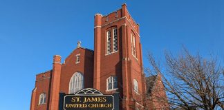 The New Canadians Centre at 221 Romaine Street in Peterborough is a non-profit organization supporting immigrants, refugees, and other newcomers to the Peterborough area that recently purchased its long-time home, the historic St. James United Church building that was built between 1908 and 1917. The church congregation continues to be a tenant in the building, along with St. James Players and the Kawartha Youth Orchestra. The building is one of the new additions to Doors Open Peterborough 2025, a free community event on Saturday, September 13 that invites visitors to tour 12 buildings and sites that are not typically not open to the public. (Photo: Bruce Head / kawarthaNOW)