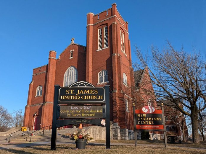 The New Canadians Centre at 221 Romaine Street in Peterborough is a non-profit organization supporting immigrants, refugees, and other newcomers to the Peterborough area that recently purchased its long-time home, the historic St. James United Church building that was built between 1908 and 1917. The church congregation continues to be a tenant in the building, along with St. James Players and the Kawartha Youth Orchestra. The building is one of the new additions to Doors Open Peterborough 2025, a free community event on Saturday, September 13 that invites visitors to tour 12 buildings and sites that are not typically not open to the public. (Photo: Bruce Head / kawarthaNOW) The New Canadians Centre at 221 Romaine Street in Peterborough is a non-profit organization supporting immigrants, refugees, and other newcomers to the Peterborough area that recently purchased its long-time home, the historic St. James United Church building that was built between 1908 and 1917. The church congregation continues to be a tenant in the building, along with St. James Players and the Kawartha Youth Orchestra. The building is one of the new additions to Doors Open Peterborough 2025, a free community event on Saturday, September 13 that invites visitors to tour 12 buildings and sites that are not typically not open to the public. (Photo: Bruce Head / kawarthaNOW)