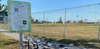 The Lindsay and District Chamber of Commerce has expanded its bike share program with new locations at Wilson Fields (pictured), Logie Park, and across from Victoria Park to provide residents and visitors of Lindsay with 25 rentable bikes across six locations. Made possible through support from the City of Kawartha Lakes Legacy C.H.E.S.T. Fund, the new bikes are intended to support tourism growth, engage new residents, and promote healthy communities. (Photo courtesy of Lindsay and District Chamber of Commerce)