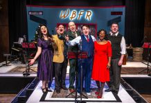 As part of its eight-play 2025-26 season, New Stages Theatre will be restaging "It's a Wonderful Life: A Live Radio Play" at Market Hall Performing Arts Centre from December 10 to 14, 2025. Pictured is the cast from the original 2023 production (Megan Murphy, Brad Brackenridge, Kerry Griffin, M. John Kennedy, Ordena Stephens-Thompson, and musical director Gabriel Vaillant), all of whom will be reprising their roles except for Stephens-Thompson. (Photo: Dahlia Katz)
