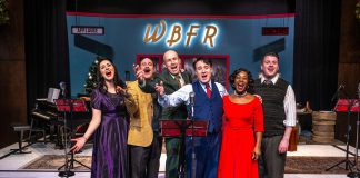 As part of its eight-play 2025-26 season, New Stages Theatre will be restaging "It's a Wonderful Life: A Live Radio Play" at Market Hall Performing Arts Centre from December 10 to 14, 2025. Pictured is the cast from the original 2023 production (Megan Murphy, Brad Brackenridge, Kerry Griffin, M. John Kennedy, Ordena Stephens-Thompson, and musical director Gabriel Vaillant), all of whom will be reprising their roles except for Stephens-Thompson. (Photo: Dahlia Katz)