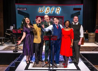 As part of its eight-play 2025-26 season, New Stages Theatre will be restaging "It's a Wonderful Life: A Live Radio Play" at Market Hall Performing Arts Centre from December 10 to 14, 2025. Pictured is the cast from the original 2023 production (Megan Murphy, Brad Brackenridge, Kerry Griffin, M. John Kennedy, Ordena Stephens-Thompson, and musical director Gabriel Vaillant), all of whom will be reprising their roles except for Stephens-Thompson. (Photo: Dahlia Katz)