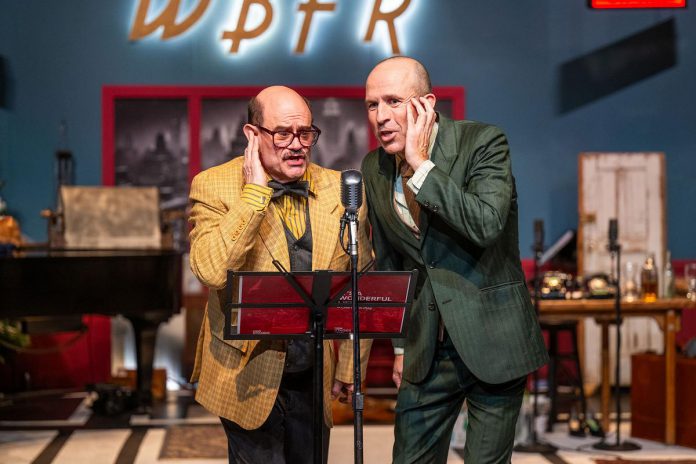 Brad Brackenridge and Kerry Griffin are among the original cast who will be returning to the Market Hall stage for New Stages Theatre's restaging of "It's a Wonderful Life: A Live Radio Play" from December 10 to 14, 2025. Megan Murphy, M. John Kennedy, and musical director Gabriel Vaillant will also be reprising their roles. New Stages artistic director Mark Wallace will also be returning as director. (Photo: Dahlia Katz)