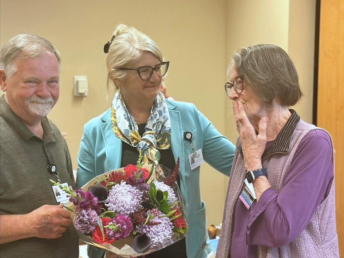 Incoming Northumberland Hills Hospital (NHH) Auxiliary president Rick Riley and Jennifer Gillard, NHH's vice-president of patient experience, public affairs, and strategic partnerships, present flowers to outgoing NHH Auxiliary president Selena Forsyth (right) at the auxiliary's annual meeting on July 24, 2025 at the Cobourg hospital. (Photo: NHH) Incoming Northumberland Hills Hospital (NHH) Auxiliary president Rick Riley and Jennifer Gillard, NHH's vice-president of patient experience, public affairs, and strategic partnerships, present flowers to outgoing NHH Auxiliary president Selena Forsyth (right) at the auxiliary's annual meeting on July 24, 2025 at the Cobourg hospital. (Photo: NHH)