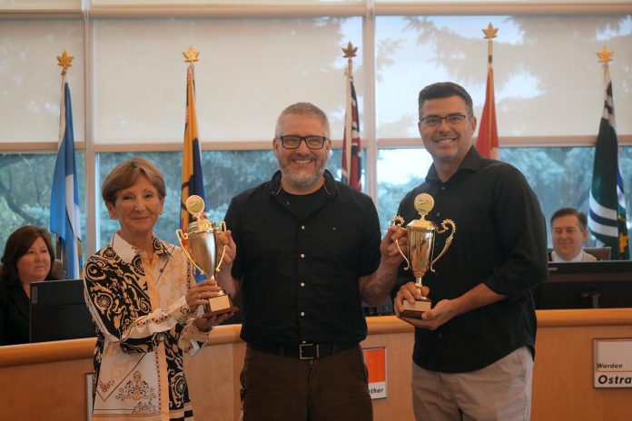 Northumberland County recently announced the winners of its 15th annual Keep the County Clean Challenge. The Town of Cobourg earned the trophy for highest proportional representation of volunteers, with five per cent of its population taking part in this year's challenge, and Cramahe Township took home the trophy for hardest-working volunteers, with each volunteer collecting an average of 15.8 kg of litter. Pictured during a Northumberland County council meeting on August 13, 2025 are Cramahe Township Mayor Mandy Martin, Northumberland County education and communications coordinator Dan Orr, and Town of Cobourg Mayor Lucas Cleveland. (Photo: Northumberland County) Northumberland County recently announced the winners of its 15th annual Keep the County Clean Challenge. The Town of Cobourg earned the trophy for highest proportional representation of volunteers, with five per cent of its population taking part in this year's challenge, and Cramahe Township took home the trophy for hardest-working volunteers, with each volunteer collecting an average of 15.8 kg of litter. Pictured during a Northumberland County council meeting on August 13, 2025 are Cramahe Township Mayor Mandy Martin, Northumberland County education and communications coordinator Dan Orr, and Town of Cobourg Mayor Lucas Cleveland. (Photo: Northumberland County)