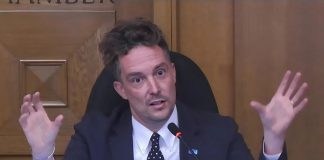 Peterborough city councillor Alex Bierk explains his motion to defer the proposed Community Wellbeing Fund, which would consolidate the city's funding streams for community project grants, community investment grants, and community service grants, during a general committee meeting on August 5, 2025. (kawarthaNOW screenshot of City of Peterborough video)