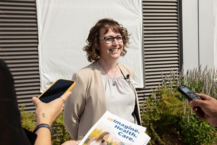 Jennifer Cox, director of mental health and addictions at Peterborough Regional Health Centre (PRHC), speaks to media during an event on August 6, 2025 to celebrate the opening of the donor-funded Psychiatric Intensive Care Unit (PICU) courtyard at the regional hospital. Cox said the new courtyard is now considered the new "gold standard in mental health care," and hospitals around the province have been showing interest in designing a similar space. (Photo: Jordan Lyall Photography for kawarthaNOW)