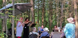 For the second year in a row, the Peterborough Symphony Orchestra is partnering with the Peterborough Field Naturalists to combine music and nature at Tecasy Ranch in Trent Hills in Peterborough County. On September 6, 2025, field guides will walk participants through an easy forested trail walk that will be interspersed with ensembles of music performances. Pictured are Jaye Marsh on flute and Jennifer Burford on violin during the inaugural event in 2024. (Photo courtesy of Peterborough Symphony Orchestra)
