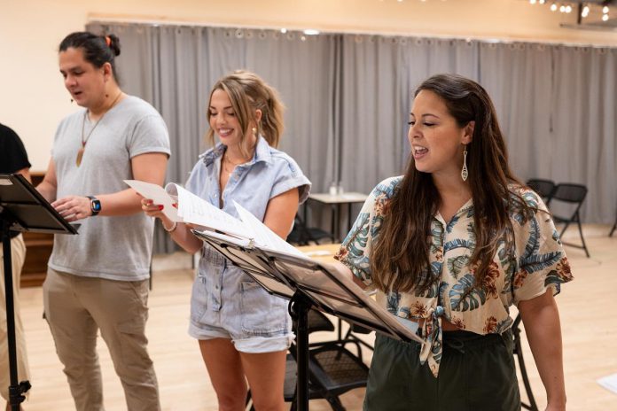 Actors Dillan Meighan-Chiblow, Emma Rudy, and Nicole Joy-Fraser during a rehearsal of "Rez Gas" by Alderville First Nation singer-songwriter Cale Crowe and Cobourg playwright and actor Genevieve Adam. (Photo: Sam Moffatt)