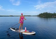 This summer, Apsley real estate agent Tania Rightmyer set out to complete a self-imposed challenge to stand-up paddleboard along the entire perimeter of Chandos Lake, one of the largest lakes in the region, to see every cottage from the water's view. Over the course of eight days, 15 hours, and more than 70 kilometres, she met with many neighbours, saw wildlife, and raised awareness about how clean the lake is. (Photo via Tania Rightmyer / Facebook)
