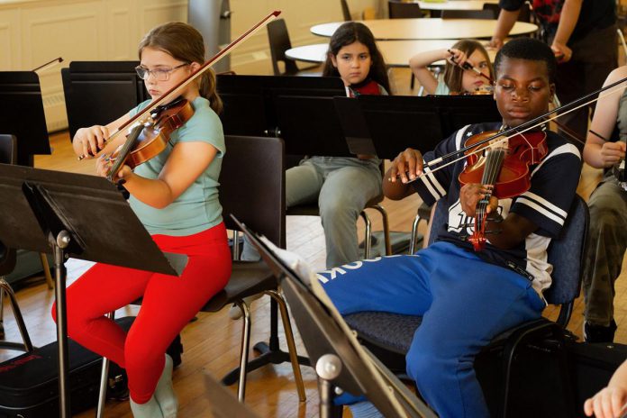 Students in the Upbeat! after-school program offered by the Kawartha Youth Orchestra have access to cello, viola, and violin instrument loans. No musical experience is required for participation in the twice-weekly program. (Photo: Kawartha Youth Orchestra)