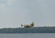A water bomber collecting water on 4 Mile Lake on August 10, 2025 to fight a 27-hectare forest fire just east of Burnt River in Kawartha Lakes. (Photo: Patrick Porzuczek / Facebook)