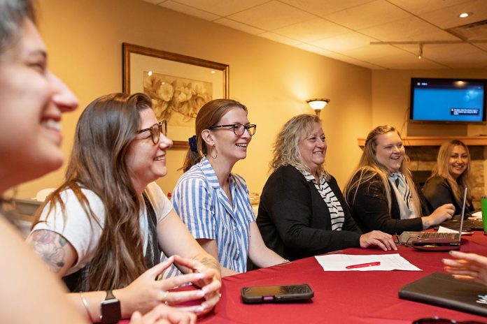 Women's Business Network of Peterborough (WBN) board members Adeilah Dahlke, Katelyn Kemp, Jessica Erickson, Cindy Koshowski, Victoria McAuley, and Akshana Katoch during a recent meeting ahead of the 2025-26 season, which has the theme "Sparking Community and Connections." New this year, the organization will select a local nonprofit organization to support during each member meeting, providing a way for members to learn about the work of community organizations while also making an collective impact. (Photo: Jordan Lyall Photography)
