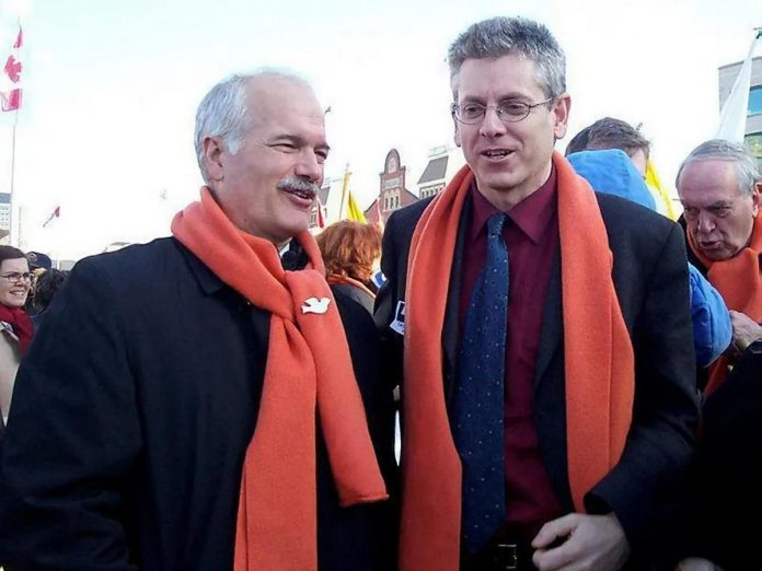 In 2002, after Charlie Angus (right) was fired from his freelance work with the CBC and TVOntario for his involvement in protests against the City of Toronto's proposal to use the abandoned Adams Mine near Kirkland Lake as a landfill for its waste, then-NDP leader Jack Layton convinced Angus to run for political office. Angus was elected as NDP MP for the Timmins-James Bay riding from 2004 until he retired in 2025. He ran for the NDP leadership in 2017, losing to Jagmeet Singh in the first round.  (Photo courtesy of Charlie Angus)