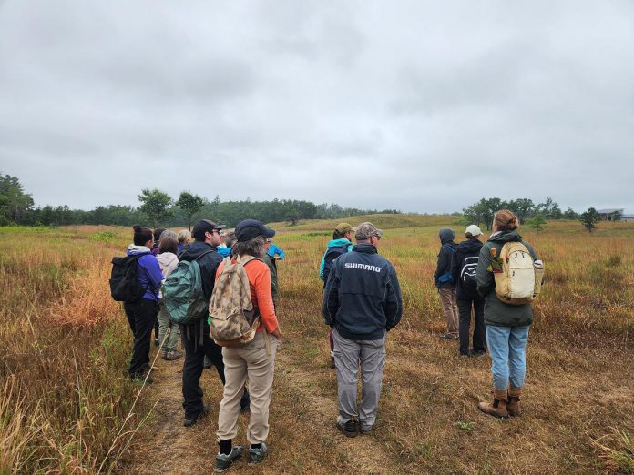 GreenUP staff and volunteers enjoyed an educational field trip to Alderville Black Oak Savanna in August, where they learned about rare oak savanna ecosystems and their restoration. (Photo: Hayley Goodchild / GreenUP)