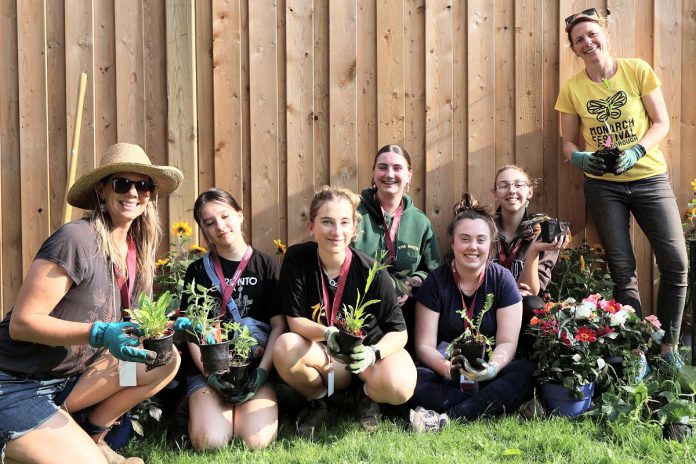 Members of the most recent Youth Climate Action Leadership Series are seen here with GreenUP education program coordinator Melissa Morris (far left) and neighbourhood and residential programs coordinator Laura Keresztesi (far right) on planting day for the YES Shelter for Youth and Families in June 2025. Supported by the Community Foundation of Greater Peterborough, the initiative led by GreenUP aims to empower youth to take climate action in myriad ways. (Photo: Justin Sutton / Community Foundation of Greater Peterborough)