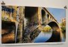 A one-of-a-kind massive print of the Hunter Street Bridge, which connects Peterborough's downtown to East City, is one of several items up in the "Keys To Hope" fundraising auction. Proceeds from the auction will support the Habitat for Humanity Peterborough & Kawarthas Region build in collaboration with Our Daughters' Home that will provide a safe, permanent home for seven women living with developmental disabilities on Sophia Street in East City. Open to community members to donate items as well as to bid, the online auction is running now until midnight on October 10, 2025. (Photo courtesy of Ashley Bonner)