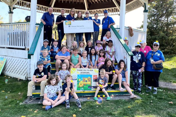 Members of the Kiwanis Club of Scott's Plains, the Rotary Club of Peterborough, and young entrepreneuers who participated in the first-ever Kiwanis Lemonade Stand Day on August 23, 2025 celebrated a donation of $30,000 to the Rotary Accessible Playground Project at Riverview Park and Zoo on Sunday, September 21. The "Lemonaders" raised $7,000 for the project, with the Kiwanis Club adding another $8,000 and the Rotary Club matching both donations for a total of $30,000. (Photo: Rotary Club of Peterborough)