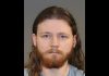 23-year-old Mathew Saunders of Peterborough has been charged with criminal harassment, possession of child pornography, five counts of an indecent act, and nine counts of voyeurism. (Photo released by Peterborough Police Service)