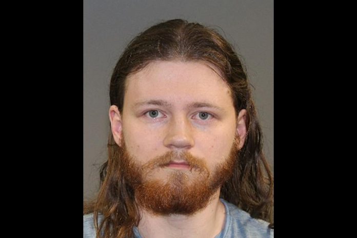 23-year-old Mathew Saunders of Peterborough has been charged with criminal harassment, possession of child pornography, five counts of an indecent act, and nine counts of voyeurism. (Photo released by Peterborough Police Service)