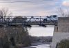 A pickup truck crosses the single-lane bridge on McFarlane Street via Ashburnham Drive on October 31, 2020. (Photo: Bruce Head / kawarthaNOW)
