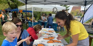 An art-making activity for kids at the 2024 Monarch Festival in Peterborough's Millennium Park. The 2025 festival returns from 10 a.m. to 2 p.m. on Saturday, September 20 and also features a 10-kilometre race raising funds for Camp Kawartha's school pollinator garden project and a one-kilometre kids' fun run. (Photo: Monarch Ultra)