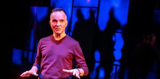 Canadian actor and playwright Jonathan Wilson performing in his one-man show "A Public Display of Affection" about his queer youth on the streets of Toronto in the late 1970s and beyond at its world premiere at Crow's Theatre in Toronto in April 2025. In partnership with Ptbo-Nogo Pride, New Stages Theatre is kicking off its 2025-26 season with a staged reading featuring Wilson on Saturday, September 20 at Market Hall Performing Arts Centre in downtown Peterborough. (Photo: Dahlia Katz)