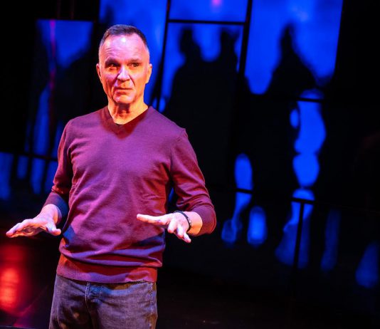 Canadian actor and playwright Jonathan Wilson performing in his one-man show "A Public Display of Affection" about his queer youth on the streets of Toronto in the late 1970s and beyond at its world premiere at Crow's Theatre in Toronto in April 2025. In partnership with Ptbo-Nogo Pride, New Stages Theatre is kicking off its 2025-26 season with a staged reading featuring Wilson on Saturday, September 20 at Market Hall Performing Arts Centre in downtown Peterborough. (Photo: Dahlia Katz)