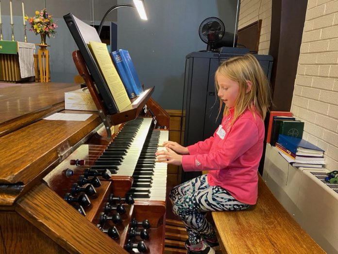 A student enrolled in the Peterborough Suzuki School of Music, a non-profit membership organization fostering piano music education for children through performance and community enrichment opportunities. The school promotes the Suzuki Method, a music education philosophy that believes any child can learn to play an instrument in the same way any child can learn a new language. (Photo courtesy of Lenore Parajka)