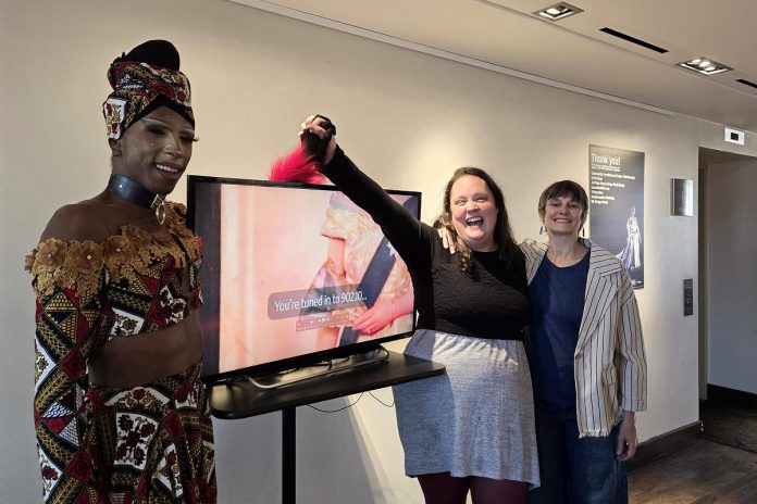 Drag performer Sahira the Djinn, Public Energy managing director Eva Fisher, and Public Energy programming director Kate Alton at Market Hall Performing Arts Centre in downtown Peterborough on September 16, 2025 during an announcement of the contemporary performance arts presenter's 2025-26 season. (Photo: Jeannine Taylor / kawarthaNOW)