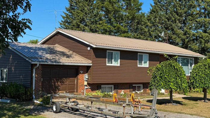 Bullarco Roofing & Full Exteriors installed an exposed-fastener metal roof for a home in Lakefield. Throughout the process of getting their roof installed or repaired, customers will be supported by the company's leadership team from the first consultation until the final walk-through. (Photo courtesy of Bullarco Roofing & Full Exteriors)