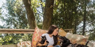 Pictured with her cat Gigi and border collie Sam, Caolaidhe Keelor is a wildlife educator, conservationist, and content creator of "Birder She Wrote" with more than 37,000 Instagram followers and nearly half a million likes on TikTok. Ever since she was introduced to a great horned owl in a classroom when she was five years old, she has had a passion for birds of prey and animals of all species. From curating a line of dog clothing and training in falconry to working as an animal handler in TV film and forming a life-changing friendship with a wild crow, Caolaidhe has built a life around working with animals and changing the stigma around the species who are plagued with the worst reputations. (Photo: Andrew Knapp)