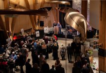 Guests at the Lakeside Gala at The Canadian Canoe Museum in Peterborough on October 4, 2025 listen to a speech by the museum's executive director Carolyn Hyslop and curator Jeremy Ward in the museum's atrium during the inaugural event that raised $150,000 in support of the not-for-profit museum and its programming. (Photo courtesy of The Canadian Canoe Museum)
