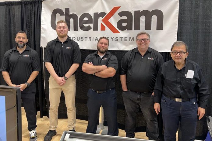 Representatives of Cherkam, including founders James Cherrett and Ahmed Kamar (far right), attended the Industrial Tradeshow at the Cobourg Community Centre on September 18, 2025. Based in the Township of Cavan Monaghan, Cherkam provides turnkey automation systems, robotics integration, vision systems and inspection, programming services, mechanical design and engineering, panel building and electrical design, Industrial Internet of Things (IIot) and Industry 4.0 solutions, and custom machine design. (Photo courtesy of Cherkam)