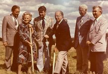 At the 1974 sod turning for the "new" Five Counties Children's Centre being built on Dutton Road in Peterborough, Mrs. J.H.C. Willoughby, the 100-year-old daughter of original property owner and former MP George Hillaire, joined then Peterborough Mayor Phil Turner and then Peterborough MPP John Turner for the event. Local Rotarians who inspired the project stand in the back row: director Ed Meyer, president Clair Hilborn, and director Carol Ciscoe. (Photo courtesy of Five Counties Children's Centre)